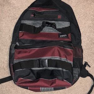 Black/white/red striped Empyre backpack.